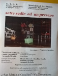 Sette sedie ed un presepe